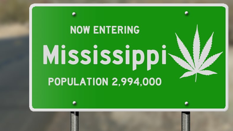 Green Mississippi road sign with cannabis leaf on it
