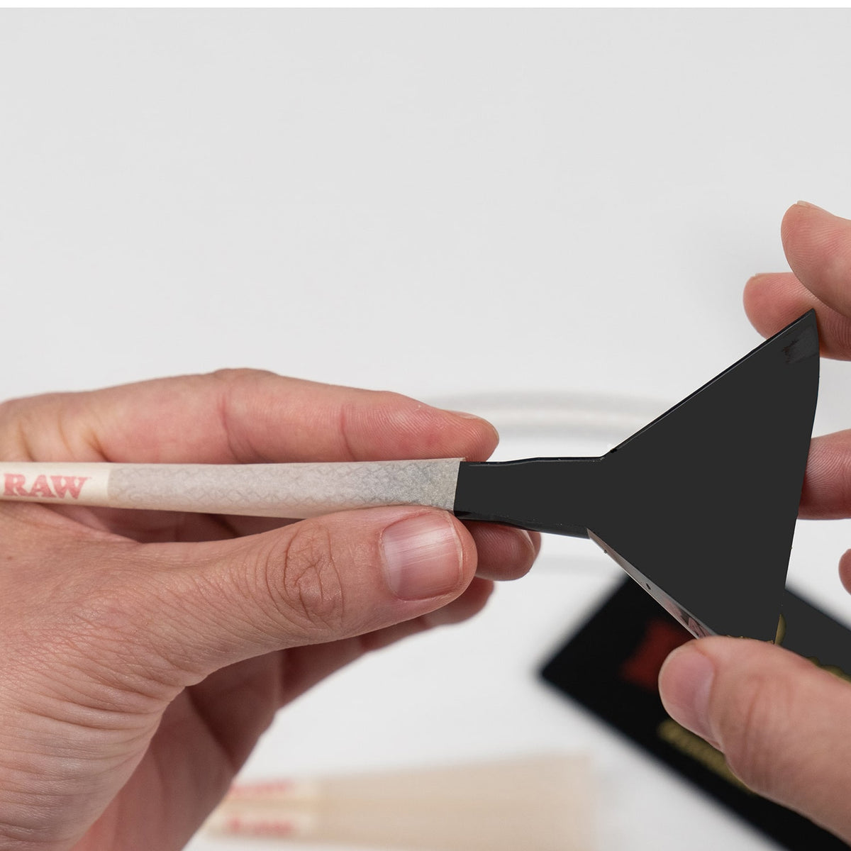 RAW cone fitting into the cone loader