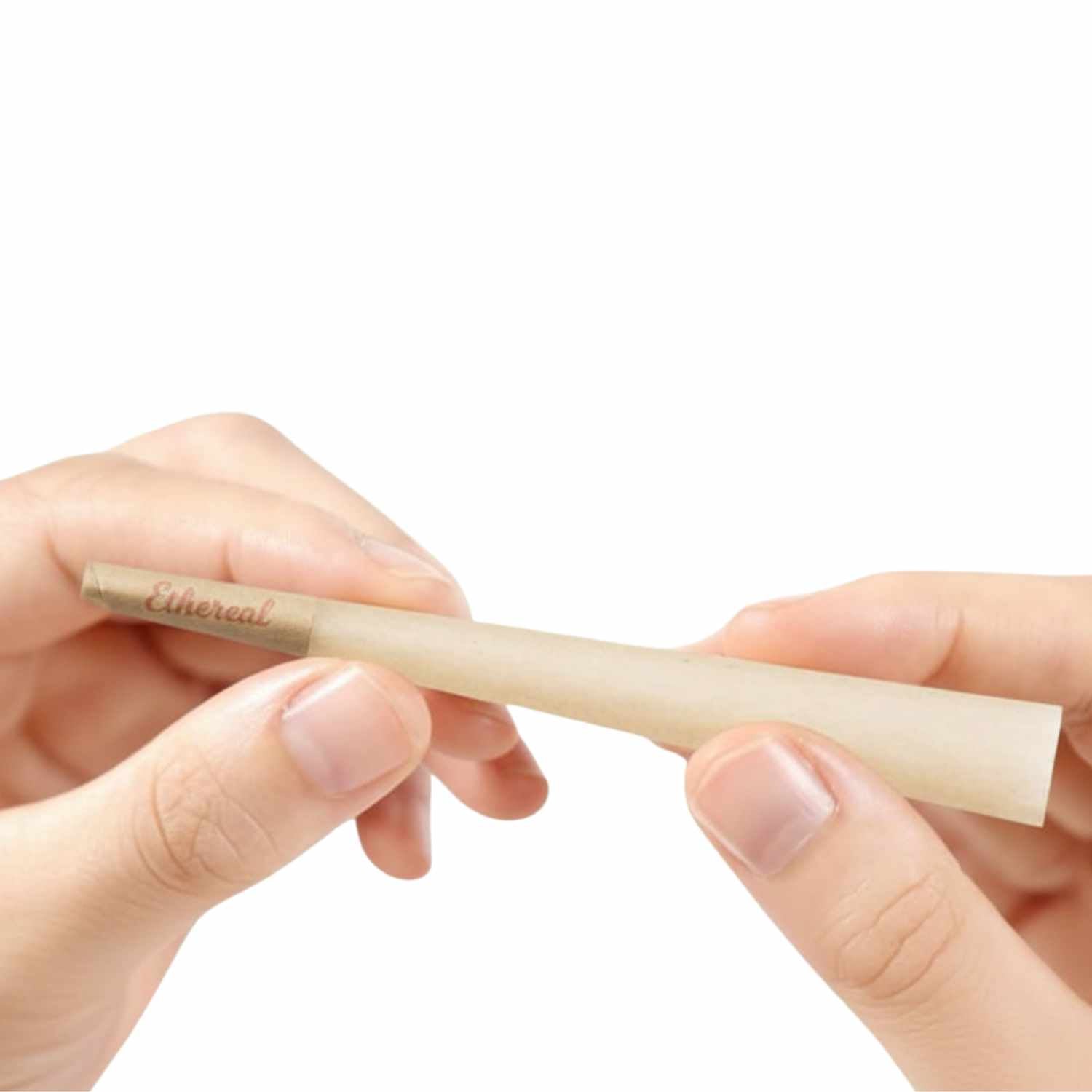 Hand holding a thin, beige object with 'Ethereal' branding on a white background